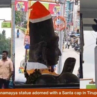 Annamayya statue adorned with a Santa cap in Tirupati