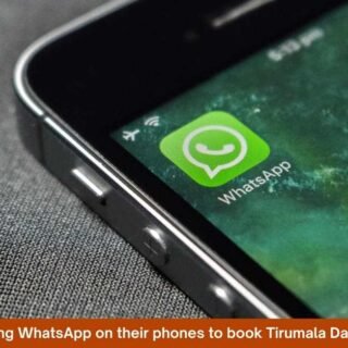 Devotees using WhatsApp on their phones to book Tirumala Darshan tickets.