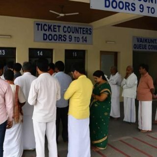 Srivani darshan ticket counters at Tirumala with devotees waiting