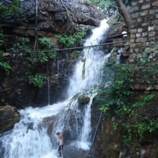 Pilgrims Tirumala Teertham Akasaganga sacred waterfall near Tirumala.