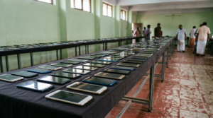Tirupati police stolen phones recovered and arranged in rows on a table before handover